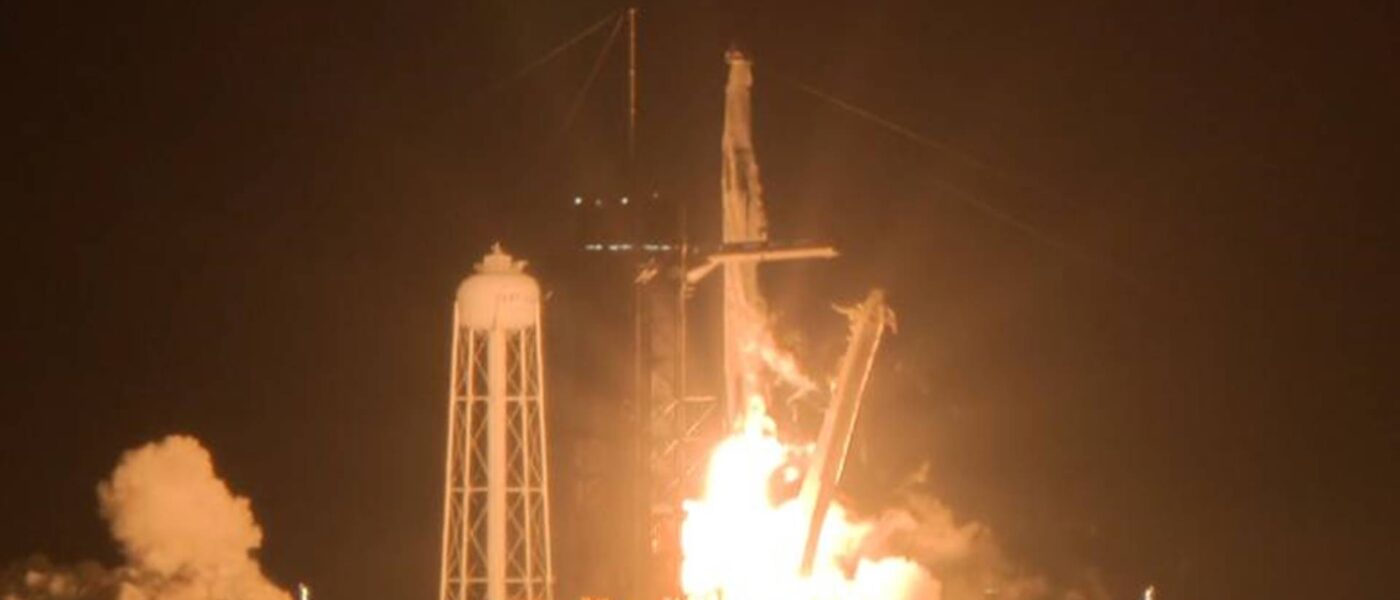 SpaceX capsule, carrying four astronauts, docks with the International Space Station