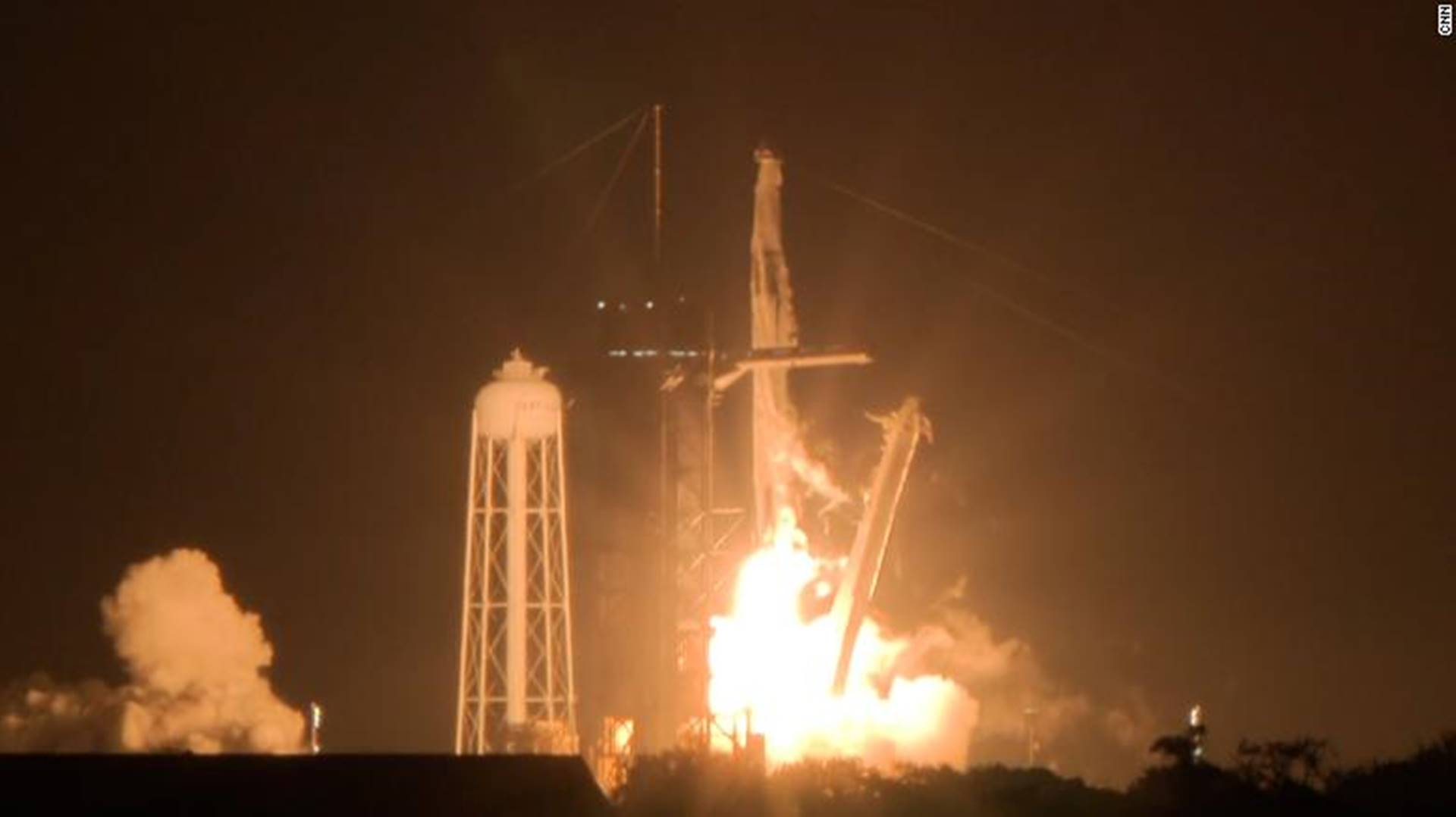 SpaceX capsule, carrying four astronauts, docks with the International Space Station