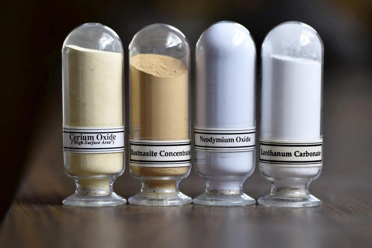 FILE PHOTO: Samples of rare earth minerals, Cerium oxide, Bastnasite, Neodymium oxide and Lanthanum carbonate are on display during a tour of Molycorp's Mountain Pass Rare Earth facility in Mountain Pass, California